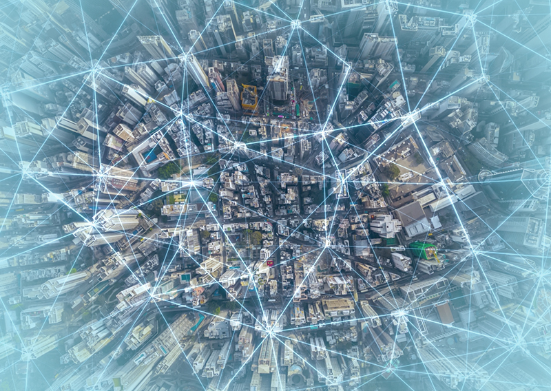 City overview with digital lines pin pointing locations.