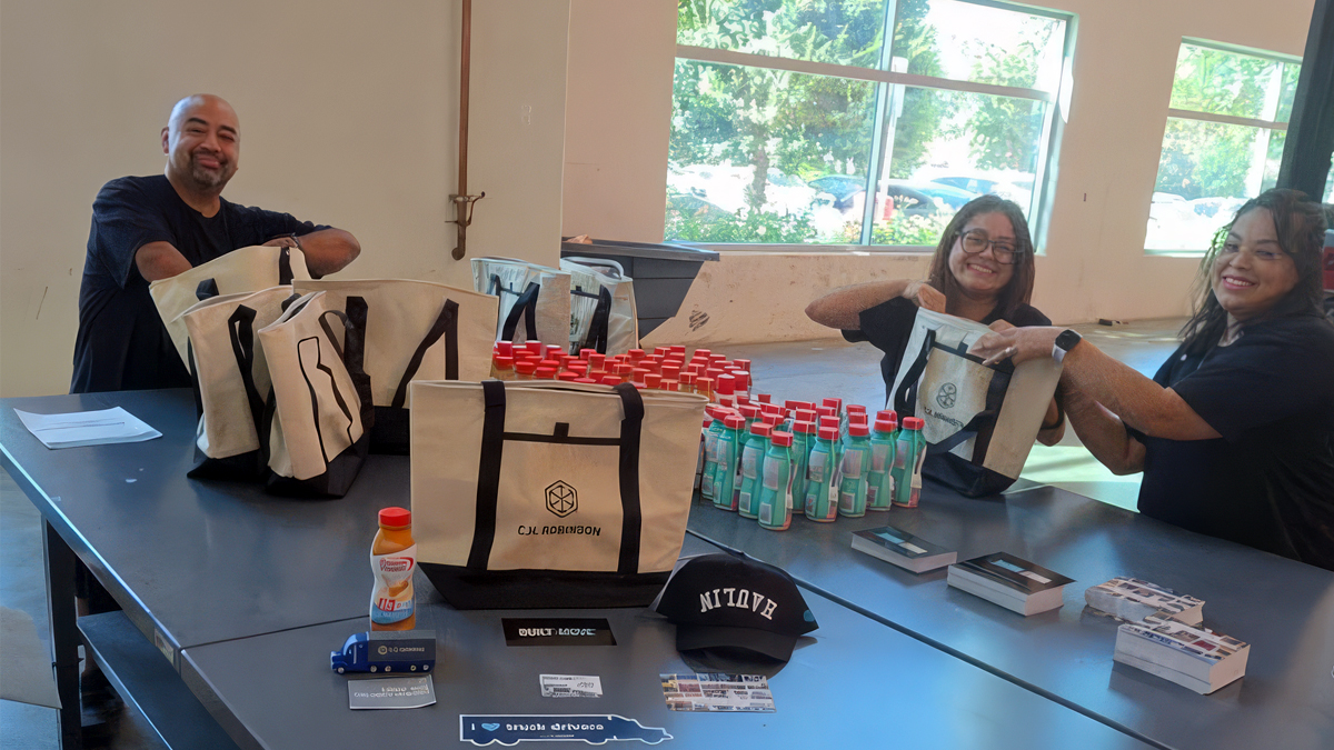 C.H. Robinson employees packing bags for truck drivers.